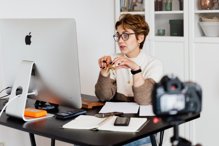 A women working from home on a virtual networking meeting